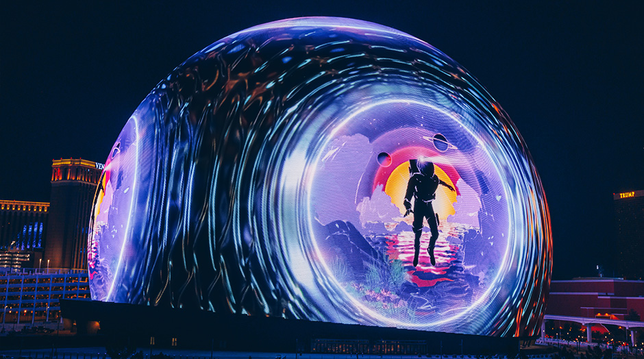 Las Vegas Sphere promoting spaceman on exosphere's LED screens at night